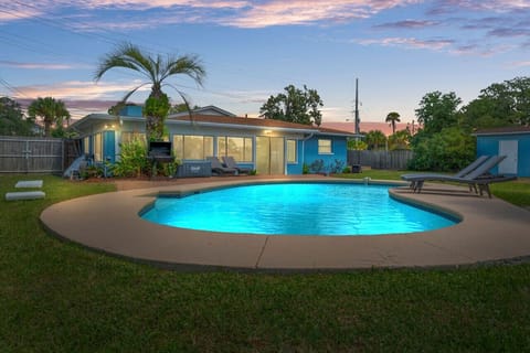 Pool deck with hot tub & loungers