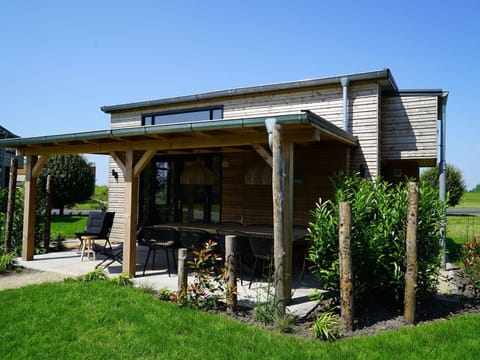 Plant, Sky, Building, Shade, Land Lot, House, Cottage, Grass, Window, Residential Area