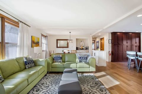 Open and bright living room that flows into the kitchen and dining area