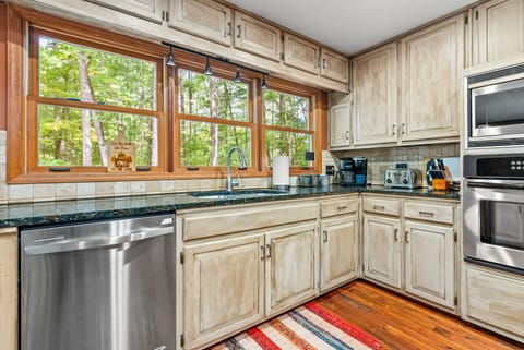 Enjoy the scenery as well as all the necessary appliances and cookware.  This kitchen is fully stocked with everything you will need for a meal anytime of the day. 