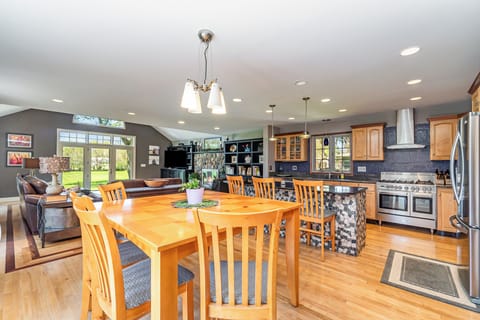 Kitchen seating for 8.  Fully stocked with dishes, glasses and appliances. 