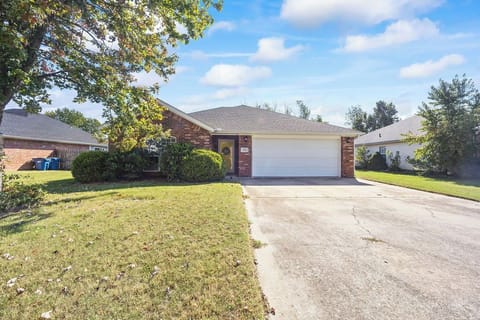Our large driveway accommodates 2 cars. Garage also accommodates 2 cars