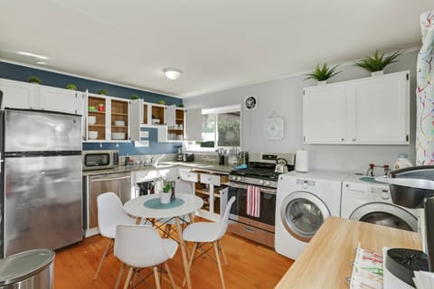 Fully stocked kitchen with SS appliances, ideal for home cooked meals