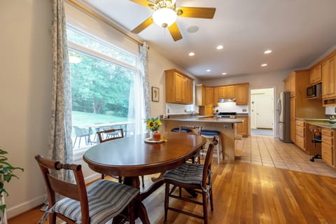 Breakfast table off set of kitchen, with a four seat table