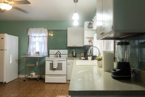 Step back in time with this beauitfully refinished kitchen 