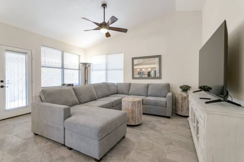 Nice size family room w/ large sectional sleeper sofa & 75" Smart TV w/ HULU