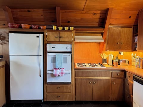Enjoy the time capsule kitchen with everything you need to make a meal. Enjoy the vintage Pyrex bowls.