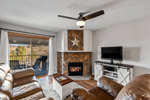 Relax by the fire on leather sofas, watch your favorite show, or step through sliding doors to the deck and mountain air.