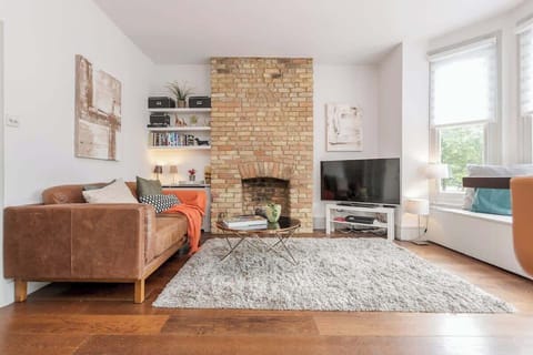 Living area - ideal to relax on the sofa while watching TV. Enjoy a beautiful view of Vauxhall Park from our window