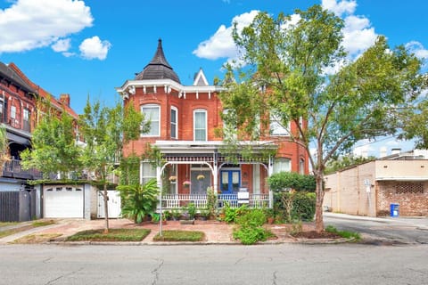 Casa d'Arte is a townhome situated on the left side of the red brick building.