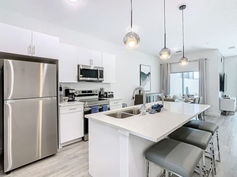 Cook up a feast in the fully stocked kitchen, equipped with everything you need for your culinary adventures.