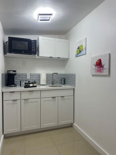 Small but mighty! This kitchenette is fully equipped for quick and easy meals.