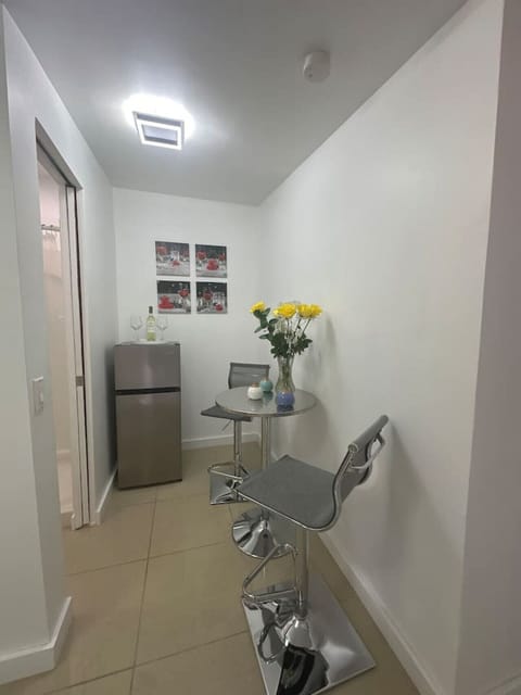 Intimate indoor dining area, ideal for enjoying a meal with a touch of home.