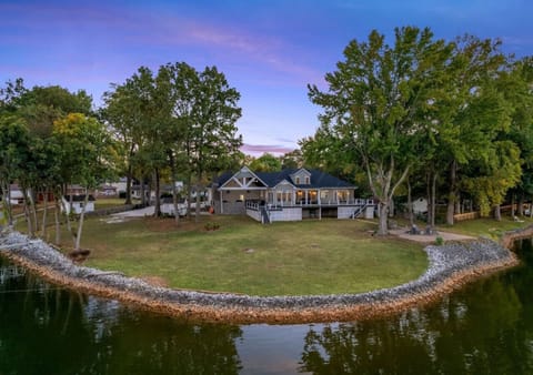 Enjoy a flat spacious lot with wonderful view of the water