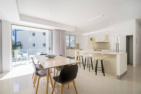 Dine at home with a six-seater table next to the kitchen.