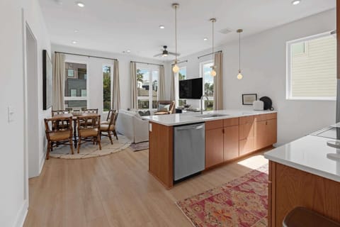 The chic, updated kitchen offers ample space & every home comfort