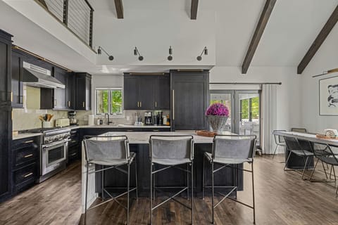 Pull up a chair and stay awhile—this kitchen was made for gathering.