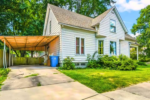 Nestled in a leafy locale, this classic home features convenient covered parking