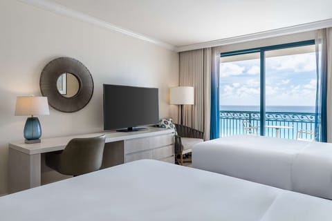 Unit with 2 Double beds. Exact unit will be assigned upon arrival. Views, colors, and decor may vary.