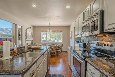 From whipping up breakfast to enjoying a late-night snack, this kitchen is designed for both convenience and luxury.