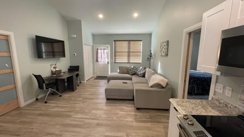 Open living/dining area.  Table will accommodate 4 people for a sit down meal.