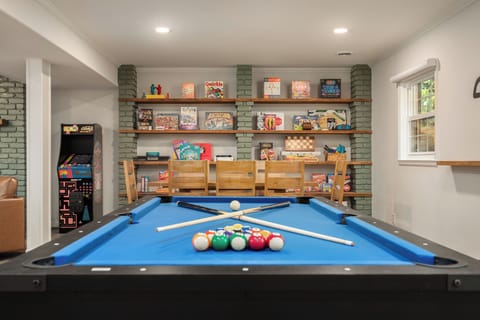 Epic Game Room with Pool and Ping Pong table, over  65 Board Games, Pac Man & Golden Tee video game machines with 20 individual arcade games,  poker table, darts, giant connect 4 and more!