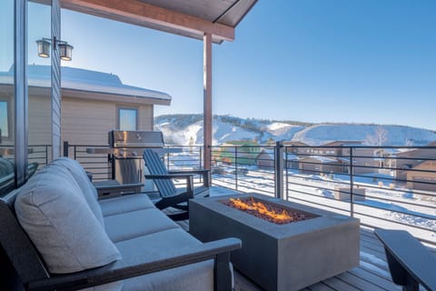 Enjoy gorgeous views of Granby Ranch Ski Resort while you relax by the firepit.