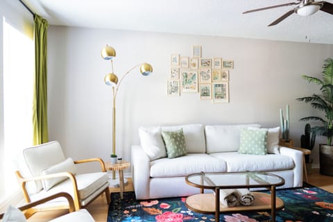 Comfort Meets Style: Sofa, Foam Chairs, and Side Furniture with a Ceiling Fan to Keep You Cool and Relaxed