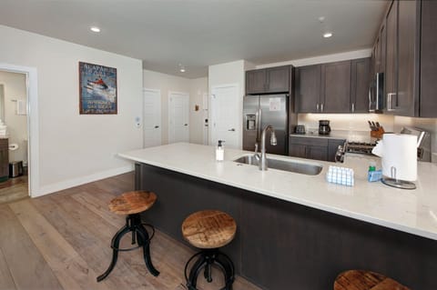 Gorgeous kitchen with stainless steel appliances. Fully stocked with everything to make delicious meals for the whole family!