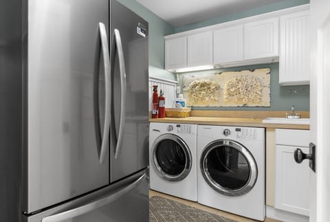 Main floor laundry with 2nd fridge