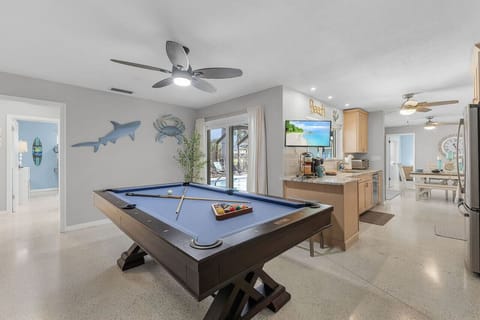 Billiard Room leading into the kitchen and guest rooms