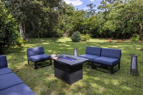 Patio in the backyard with cozy seating