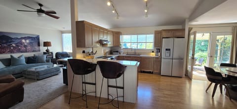 Newly refreshed open-plan living room and kitchen.