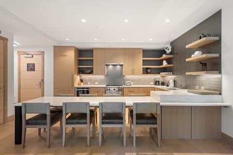 Gather around the large island, the ultimate dining area that combines style and function, perfect for meals, casual chats, and making memories with loved ones.