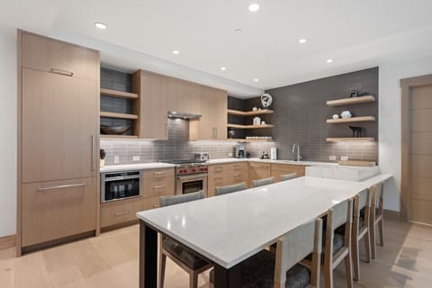 This fully stocked kitchen has everything you need to prepare a gourmet meal, from high-end appliances to all the tools and cookware for your culinary creations.