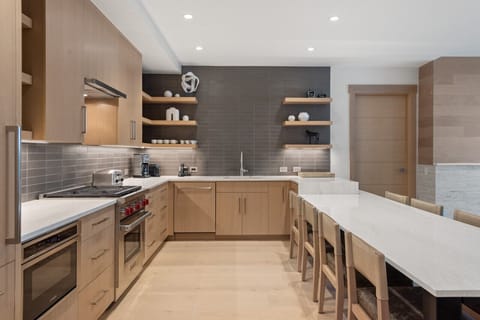 Cook in style with premium appliances, including a sleek oven, spacious fridge, and other high-end features that not only elevate your culinary experience but also add a touch of elegance to the space.