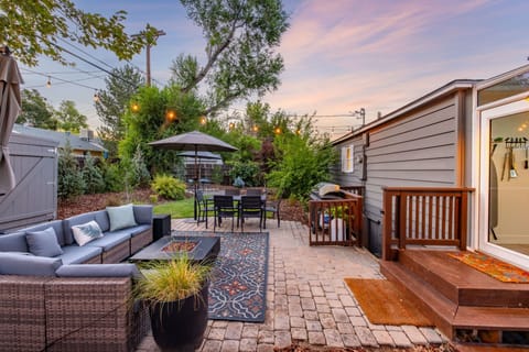 The backyard offers a variety of seating in different locations, allowing for flexibility to meet your needs. 