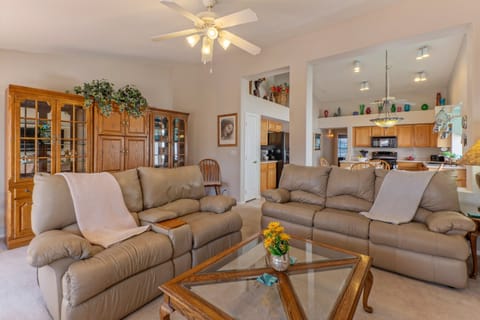 Welcome to AZ THIRTY DAY STAY with a cozy gathering area in the open concept great room.