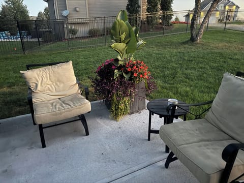 First level patio with a 6 ft fenced in yard.