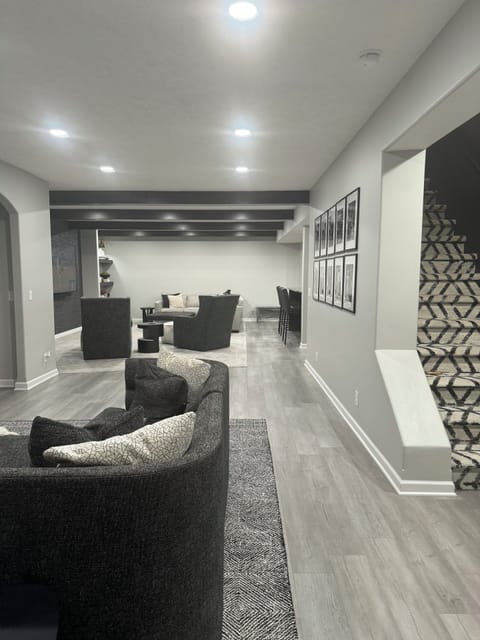 Additional seating area in basement area with tv