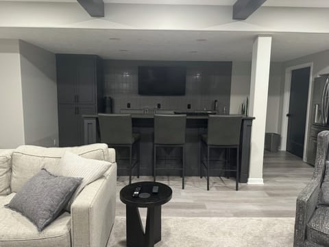 Enjoy watching sports or playing games in the bar area in the basement.