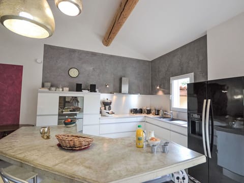 Countertop, Cabinetry, Property, Kitchen, Wood, Lighting, Sink, Kitchen Appliance, Interior Design, Kitchen Stove