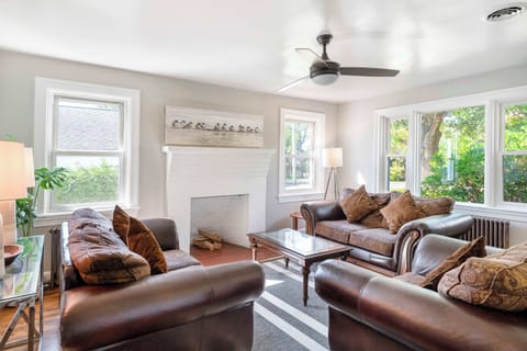 Sink into the comfort of a stylish leather sofa in the inviting living room—perfect for cozy evenings!