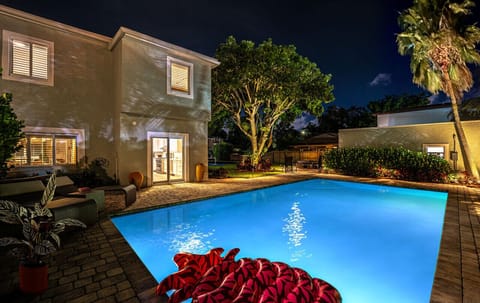 Experience the enchanting atmosphere of the pool at night, featuring a cozy float in the water. The soft lighting creates a tranquil ambiance, ideal for evening relaxation.