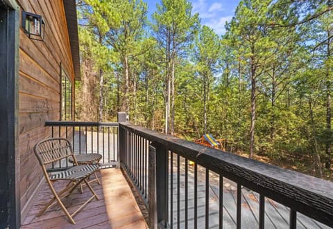 Step out and let the forest be your backdrop. This patio is your secluded corner in the woods—perfect for quiet contemplation or just enjoying the view.