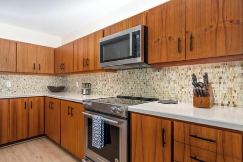 Kitchen with luxurious Koa Wood cabinetry, fully updated