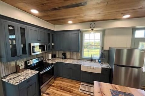 Custom kitchen cabinetry with granite countertops
