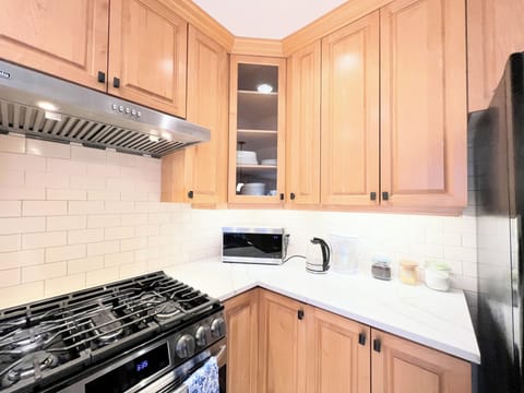 Plates, mugs, glasses, cutlery, coffee maker, kettle, water pitcher are provided