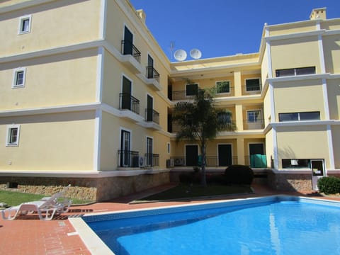 The pool is at the rear of the property and can be seen from the kitchen and bedroom of the apartment. 