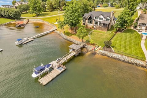 Aerial view of the dock, boat ramp and property
